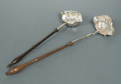 Lot 436 - Two George II silver punch ladles