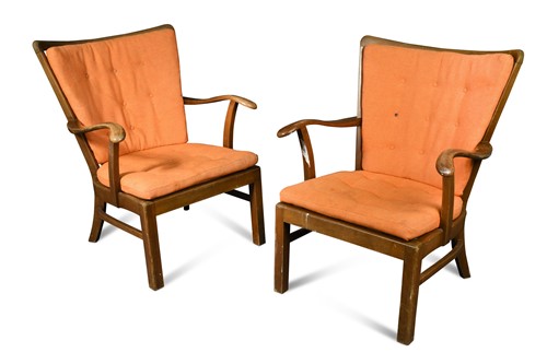 Lot 312 - Fritz Hansen, a pair of stained beech lounge chairs