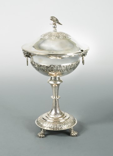 Lot 427 - A continental - possibly German - metalwares decorative cup and cover