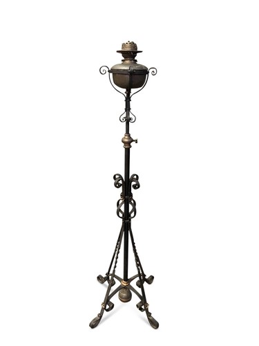 Lot 675 - An Arts & Crafts copper and wrought iron standard lamp in the manner of W/.A.S Benson