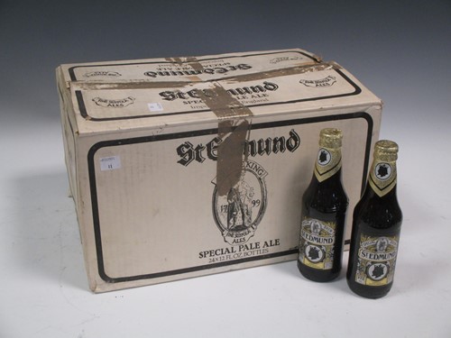 Lot 25 - A collection of stoneware beer bottles, a...