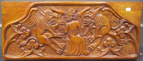 Lot 166 - A reproduction carved panel of King Herald on...