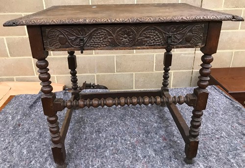 Lot 374 - An 18th century oak and later carved side...