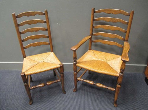 Lot 354 - A set of ten reproduction ladder back chairs...