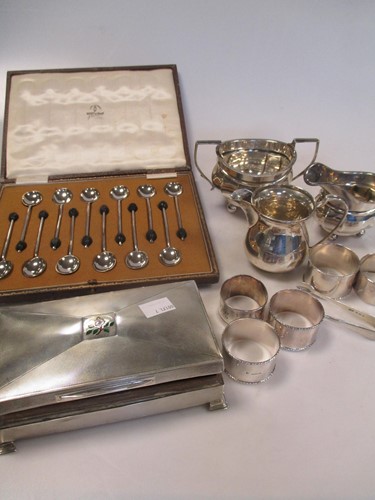 Lot 126 - Two silver milk jugs, a silver sugar bowl, 5...