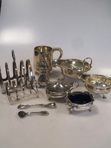 Lot 124 - A mid 18th century silver sauceboat and...
