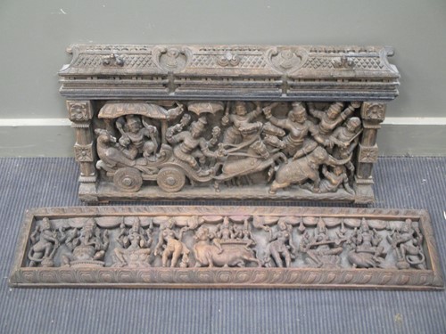Lot 165 - Two Indian carved hardwood panels, depicting...