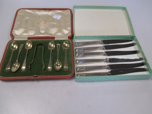 Lot 122 - A cased set of 6 silver gilt coffee spoons...