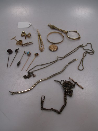 Lot 99 - A collection of five stickpins, together with...