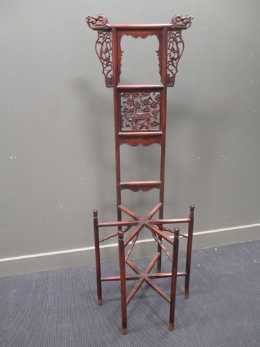 Lot 323 - A 19th century Chinese carved hardwood hall...