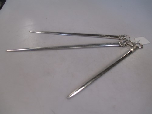 Lot 127 - Three silver meat skewers, two George III and...