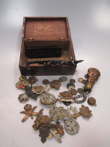 Lot 86 - A copper and brass 'serpent' body powder flask...