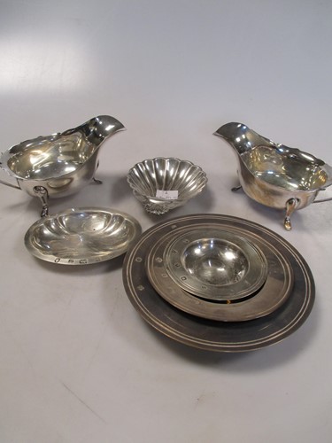 Lot 123 - A pair of silver sauce boats by Viners, three...