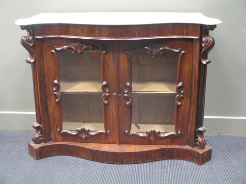 Lot 349 - A Victorian rosewood serpentine side cabinet...