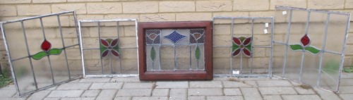 Lot 170 - A collection of five leaded glass panels...