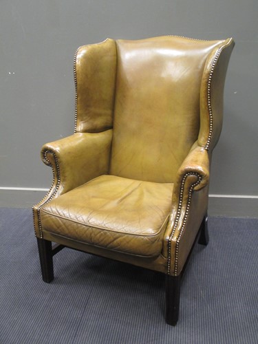 Lot 297 - A George III style leather library armchair...