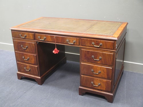 Lot 371 - A Georgian style mahogany twin pedestal desk...