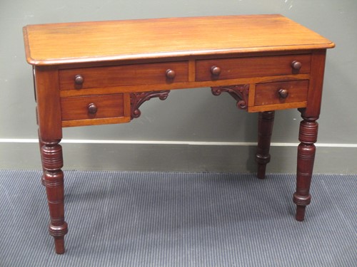 Lot 351 - A late Victorian writing table of four four...