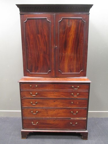 Lot 356 - A George III mahogany secretaire cabinet, 226...