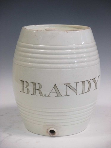 Lot 29 - A 19th century creamware spirit barrel...