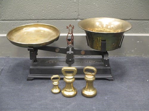 Lot 168 - A large set of brass scales and weights