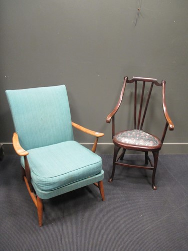 Lot 324 - An ercol armchair together with arm chair (2)