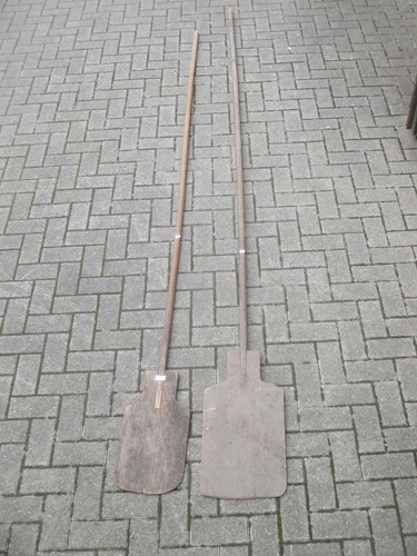 Lot 169 - Two bakers bread paddles and clothes