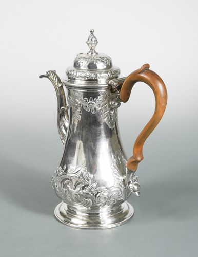 Lot 457 - A George II silver coffee pot