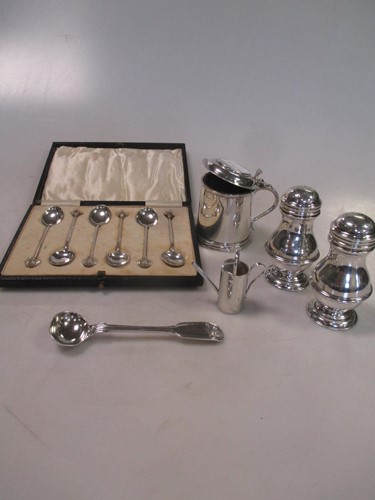Lot 134 - A collection of silver to include a pair of...