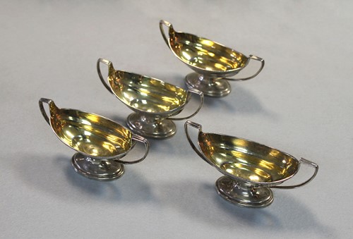 Lot 460 - A set of four George III silver salts