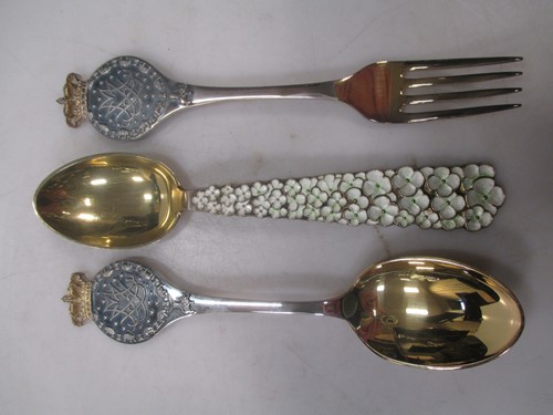 Lot 174 - A Michelsen Danish metalware and enamel spoon