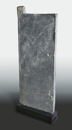 Lot 148 - A Chinese black stone tomb panel, perhaps Han Dynasty (206 B.C - 220 A.D)