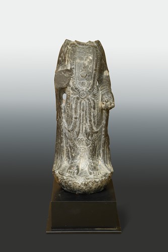 Lot 145 - A dark limestone torso of a Bodhisattva, perhaps Northern Qi Dynasty (550 AD - 577 AD)