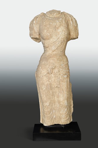 Lot 110 - A Chinese white marble standing Avalokiteshvara, torso only, Tang Dynasty style