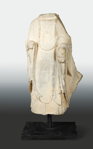 Lot 116 - A Chinese limestone Buddhist deity, torso only, perhaps Wei Dynasty