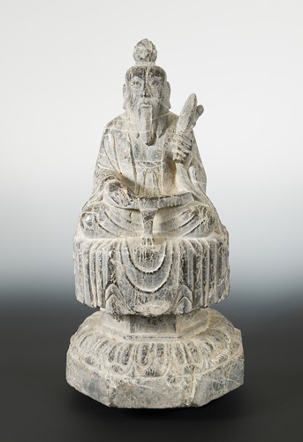 Lot 122 - A Chinese limestone seated figure of Laozi on a pedestal, Wei Dynasty style