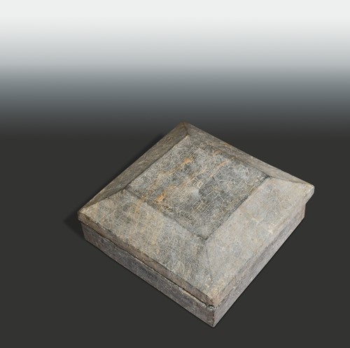 Lot 129 - A Chinese limestone square ancestor box and lid, perhaps 6/7th century