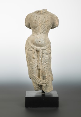 Lot 140 - A Chinese limestone torso of an enrobed female figure, in Tang Dynasty style