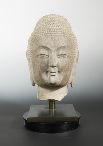 Lot 157 - A Chinese limestone head of Buddha, Northern Qi style