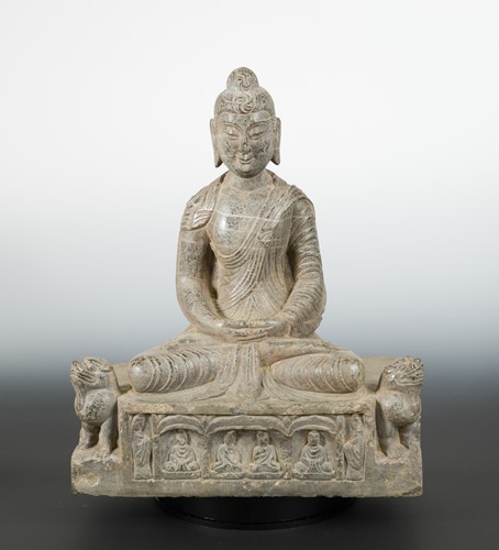 Lot 162 - A Chinese grey veined marble Seated Buddha, in Northern Wei style