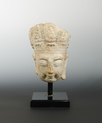 Lot 169 - A Chinese limestone head of Avalokiteshvara, perhaps Sui Dynasty (581-618 AD)