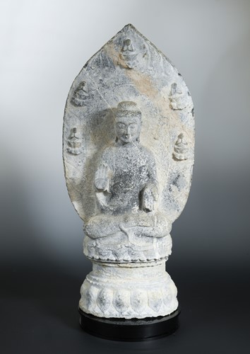 Lot 172 - A Chinese grey stone figure of a seated Buddha, in Wei Dynasty style