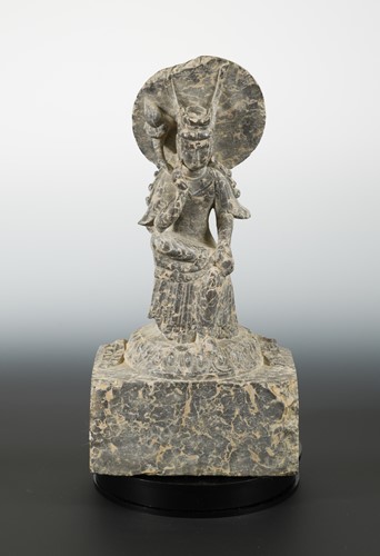 Lot 174 - A Chinese mottled marble seated meditating Guanyin, in Wei Dynasty style
