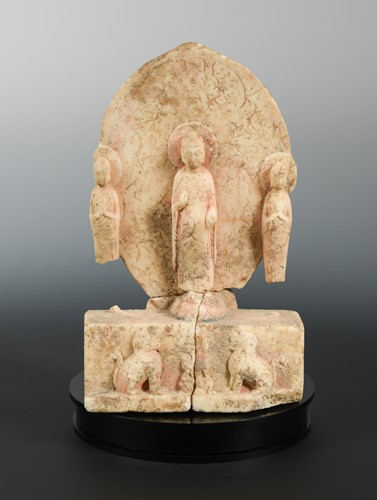 Lot 177 - A Chinese white marble Buddhist triad group, in Northern/Eastern Wei style