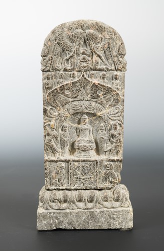 Lot 180 - A Chinese brown mottled stone Buddhist small votive stele, possibly Northern Wei Dynasty