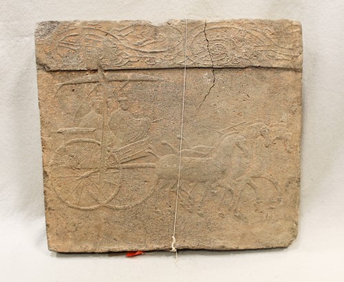 Lot 182 - A Chinese grey pottery architectural tile relief, perhaps Han Dynasty