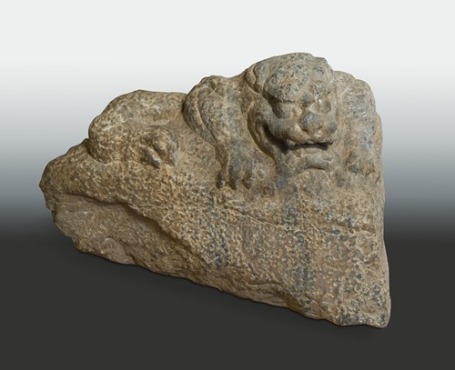 Lot 185 - A Chinese stone recumbent Fo dog, possibly Sui Dynasty (581 AD - 618 AD)