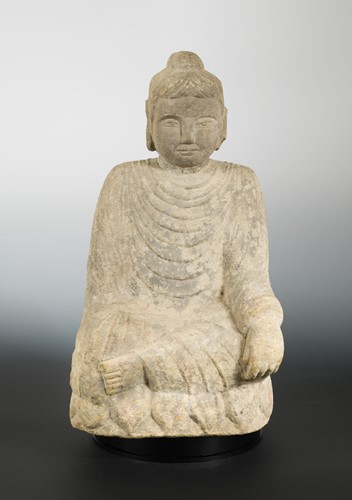 Lot 200 - A Chinese cream sandstone figure of a Buddha, in early Sui Dynasty style