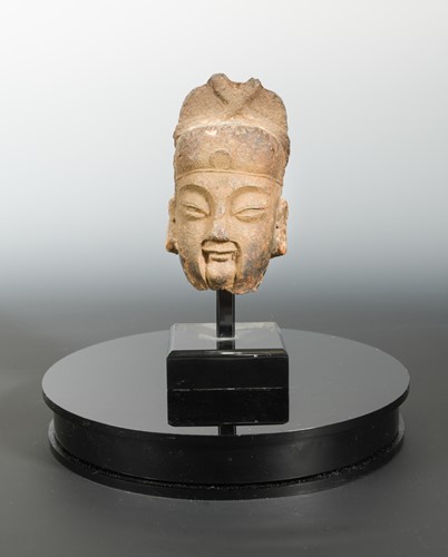 Lot 211 - A Chinese cast iron head of an Official