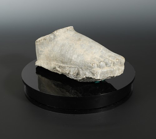 Lot 226 - A Chinese grey limestone foot fragment from a Buddhist deity, possibly late 6th century